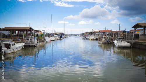 view at high tide of the ostreicole port of andernos on the arcacchon basin in France