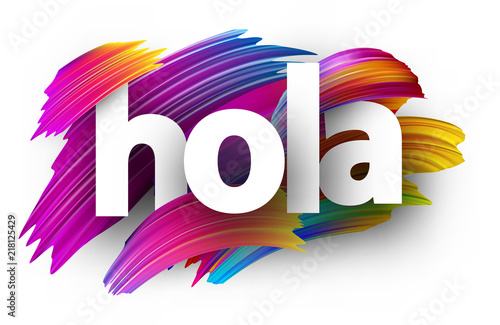 Hola sign with colorful brush strokes. photo