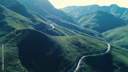 Drone footage full HD, Mountains covered by very green grass and trees, big routes between the mountains, these videos were shoot close to Georges in the the garden route JUN 2028 photo