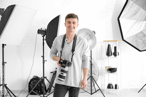 Young male photographer in ...