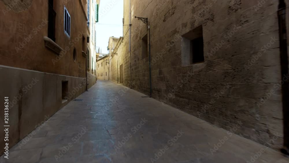 Rear view tourist woman Walking narrow streets of Barcelona Wearing cute summer dress enjoying European summer holiday travel vacation adventure Rear view tourist woman Walking narrow streets of Barcelona Wearing cute summer dress enjoying European summer holiday travel vacation adventure