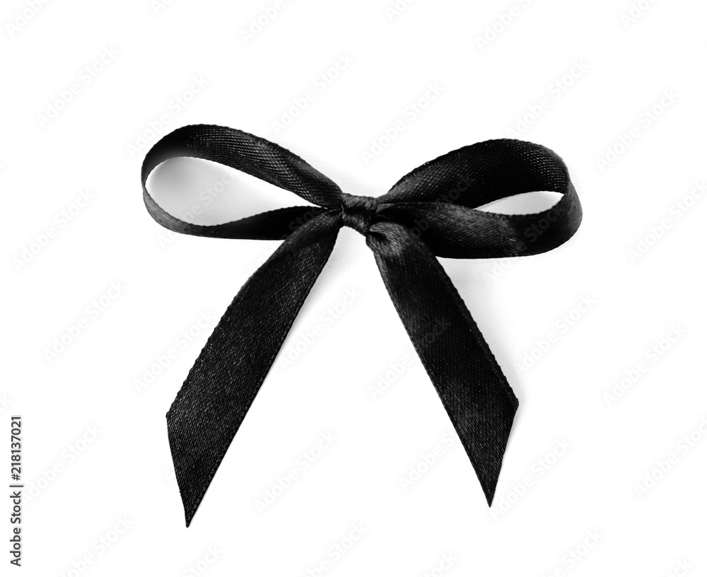 Black ribbon bow on white background. Funeral accessory Stock Photo