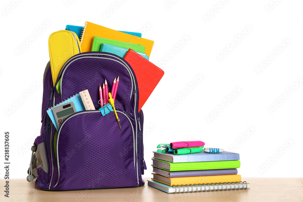 Color backpack with stationery on white background. Ready for school Color backpack with stationery on white background. Ready for school
