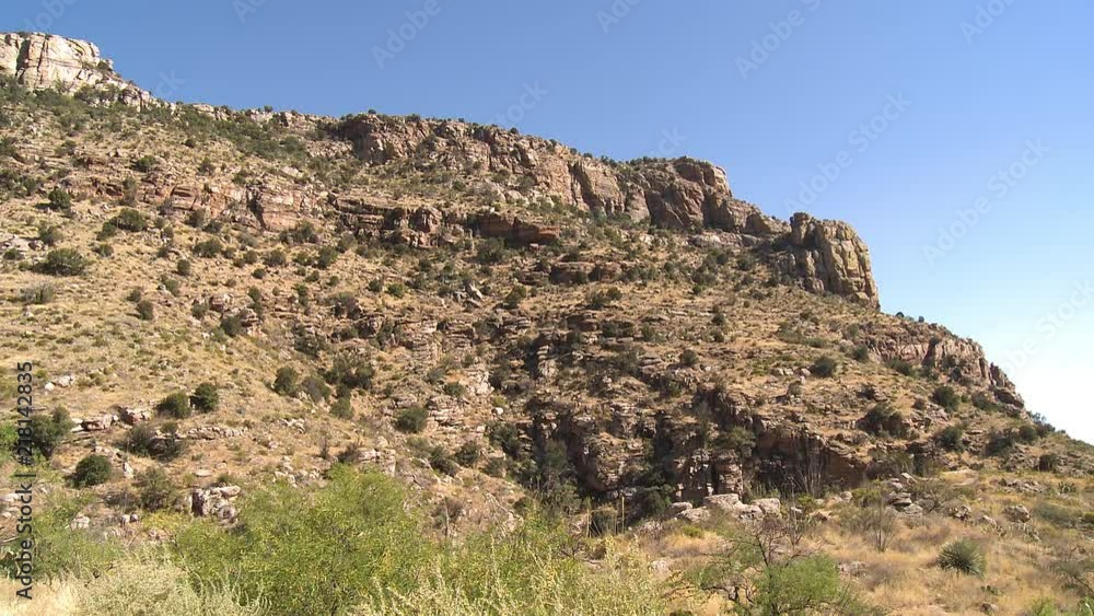 Static shot of the Catalina Mountains from the grassy foothills to the rugged peaks on a sunny day with deep blue skies near Tucson, Arizona. Static shot of the Catalina Mountains from the grassy foothills to the rugged peaks on a sunny day with deep blue skies near Tucson, Arizona.