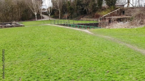 drone flying Low over a small field. photo