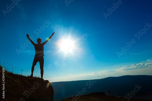 Man Celebrating Against Sun © BillionPhotos.com