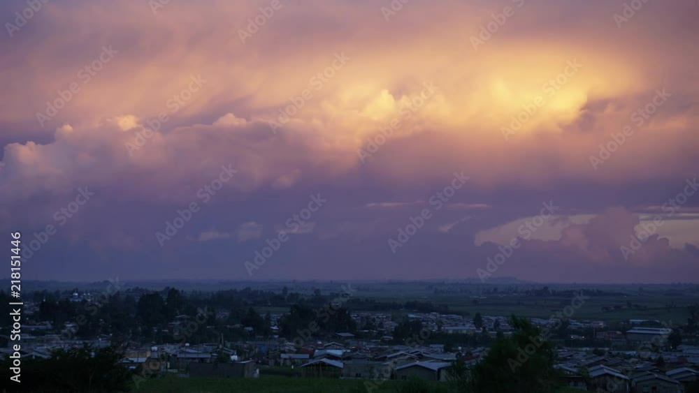 Dramatic time lapse of clouds at sunset in Ethiopia with bands of sunlight fading in and out Dramatic time lapse of clouds at sunset in Ethiopia with bands of sunlight fading in and out