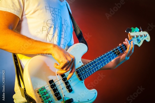 Photos Closeup of a Musician Playing an Electric Bass