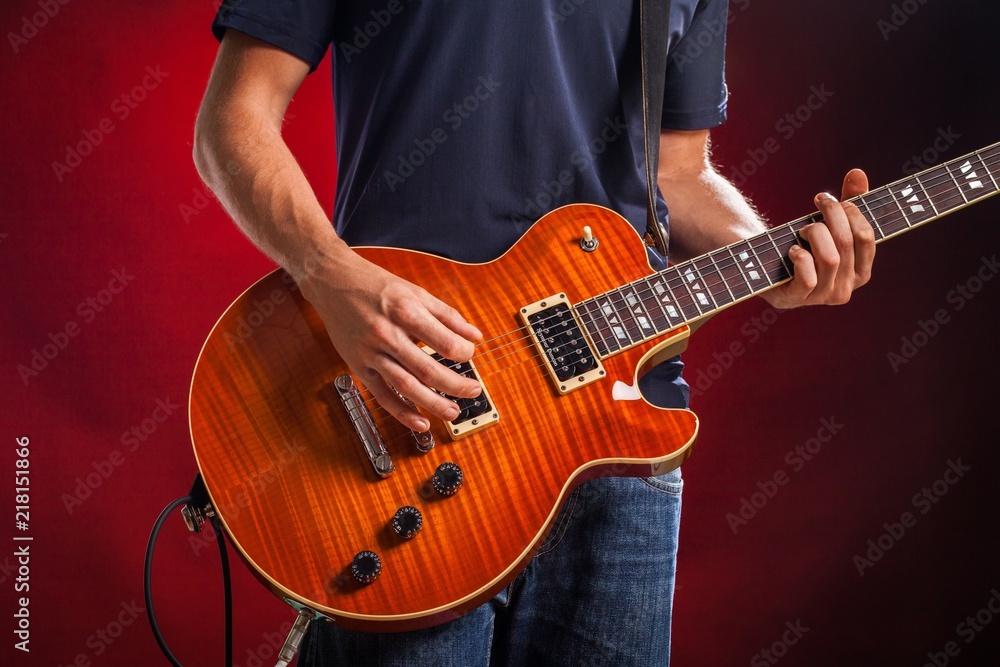 Closeup of a Musician Playing an Electric Guitar