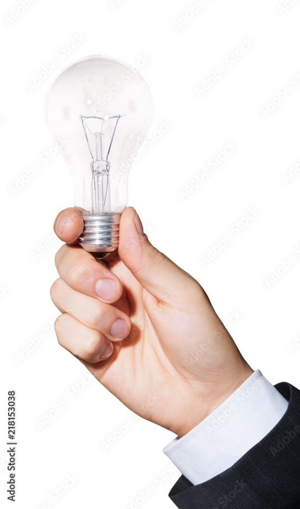 Closeup of Businessperson Holding a Light Bulb Closeup of Businessperson Holding a Light Bulb