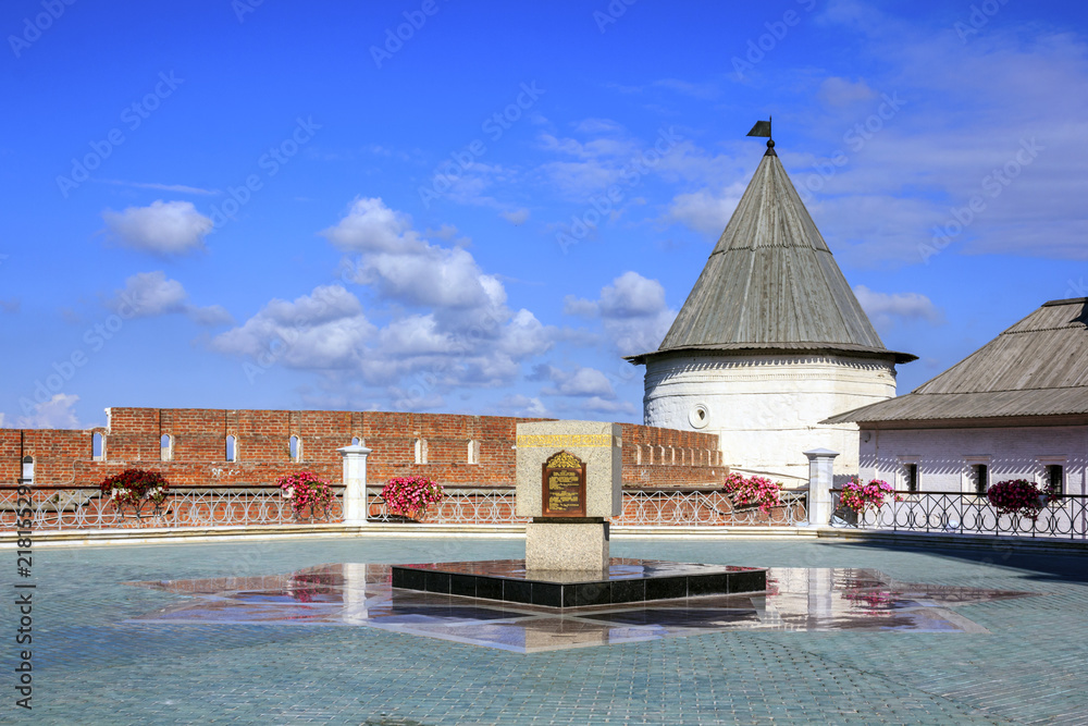 Memorial stone dedicated to the laying of the Qolşärif (Kul-Sharif) Mosque in Kazan Kremlin, Tatarstan, Russia. Sunny summer morning.