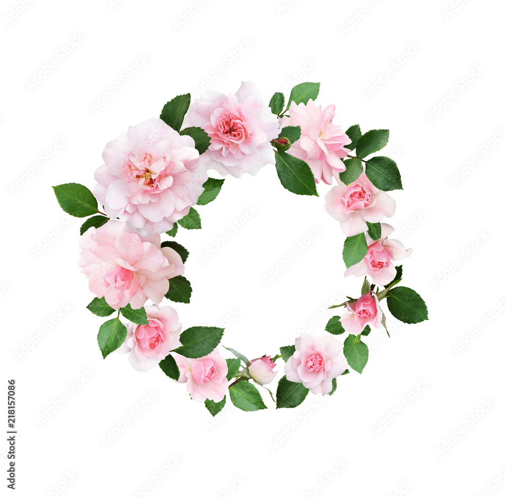 Fototapeta premium Pink rose flowers and green leaves in a round floral arrangement
