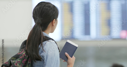 Photography Travel woman holding passport in the airport