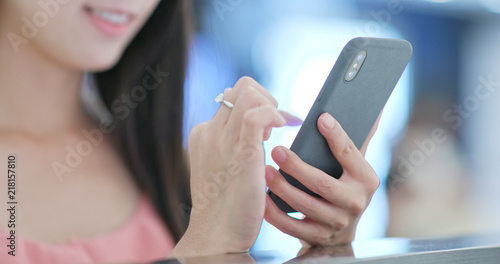 Woman use of smart phone with blur view background