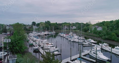 Conneticut Drone 4K Footage Approch Boat Harbor Fly Over Trees photo