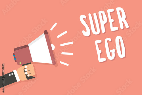 Text sign showing Super Ego. Conceptual photo The I or self of any person that is empowering his whole soul Man holding megaphone loudspeaker pink background message speaking loud. photo