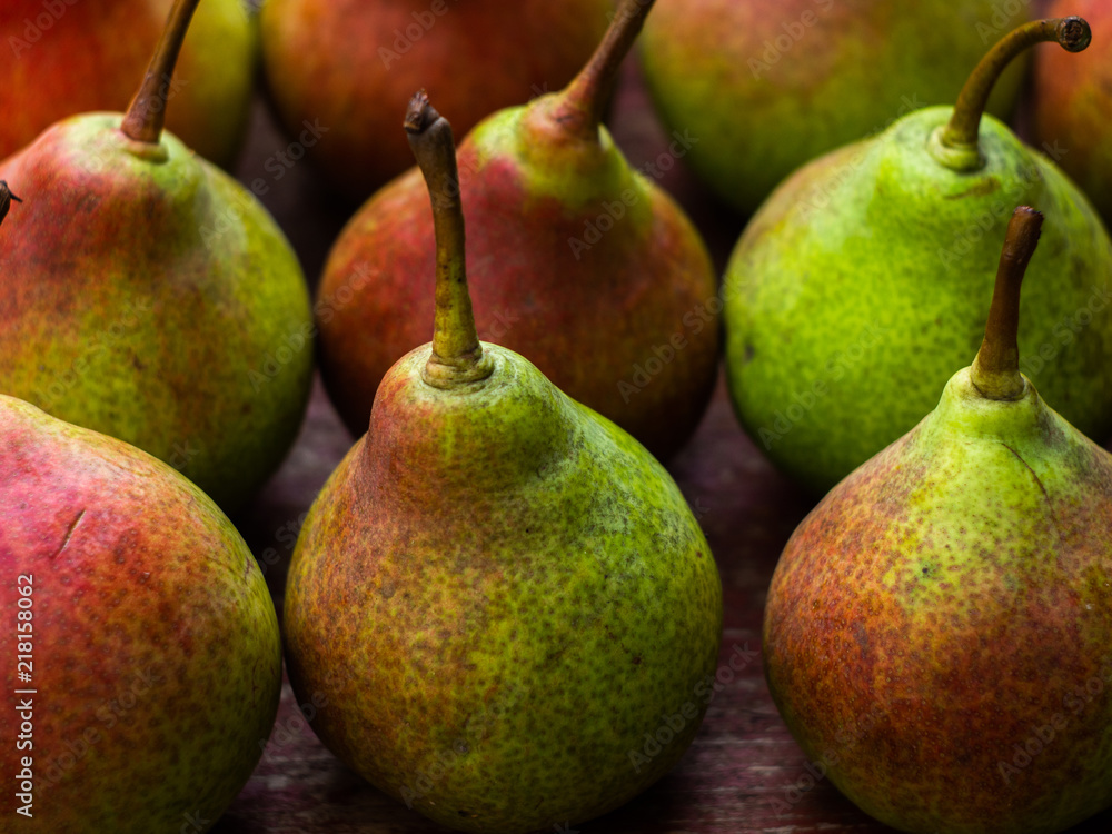 Fresh ripe organic yellow pears on wooden background. Vegetarian, vegan, healthy diet food. Fruit background. Pears harvest. Fresh ripe organic yellow pears on wooden background. Vegetarian, vegan, healthy diet food. Fruit background. Pears harvest.
