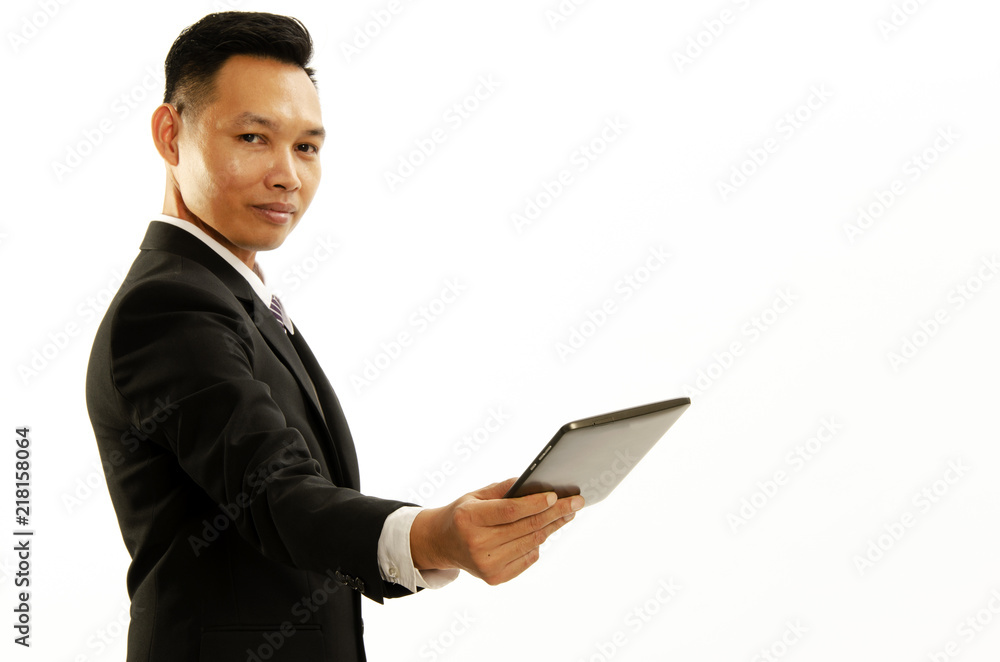 Smart business man hand holding tablet and giving forward on white backgrounds. Place for you text Smart business man hand holding tablet and giving forward on white backgrounds. Place for you text