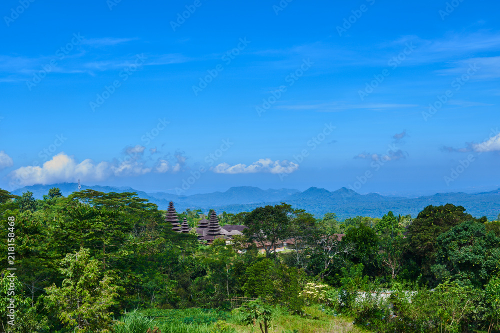Obraz premium Colorful Balinese landscape with a temple. Temples in Pura Penataran Agung Besakih complex, the mother temple of Bali, Indonesia. Several balinese temples. Travel and ancient architecture background.