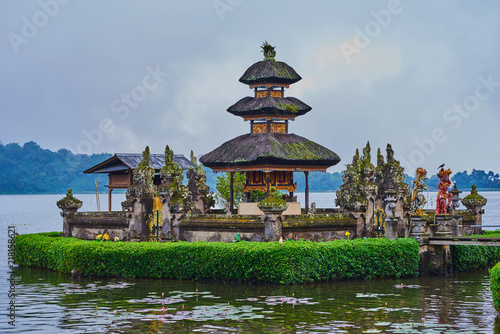 Colorful Balinese landscape with a temple. Ulun Danu Beratan Temple of Bali Island, Indonesia. Several balinese temples. Travel and ancient architecture background. Traditional balinese style.