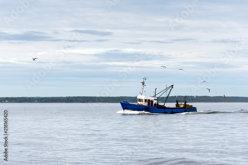 Fishing boat in gulf of Riga, Baltic sea.