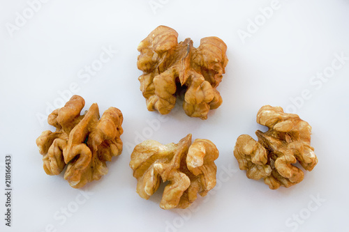 Detail of isolated walnuts on a white background