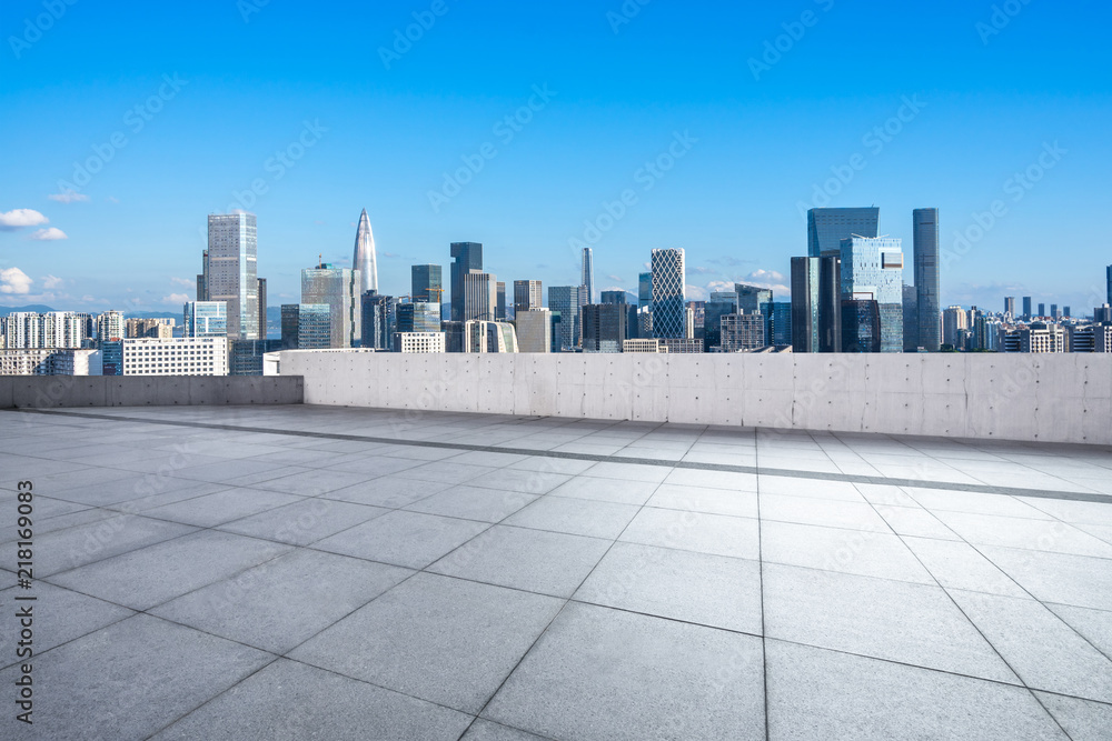 city skyline with empty square