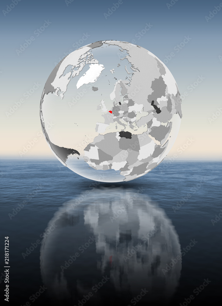 Belgium on translucent globe above water Belgium on translucent globe above water