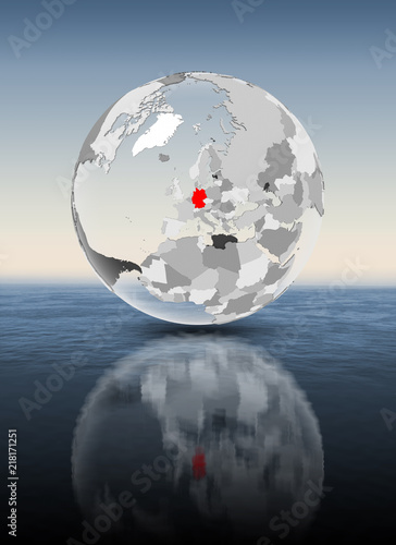 Fototapeta Naklejka Na Ścianę i Meble -  Germany on translucent globe above water