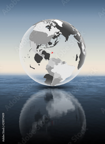 Haiti on translucent globe above water