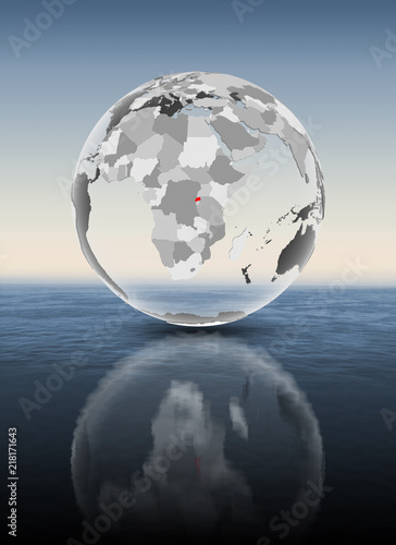 Fototapeta Naklejka Na Ścianę i Meble -  Rwanda on translucent globe above water