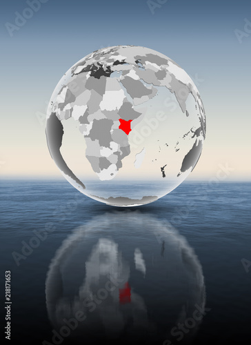 Kenya on translucent globe above water