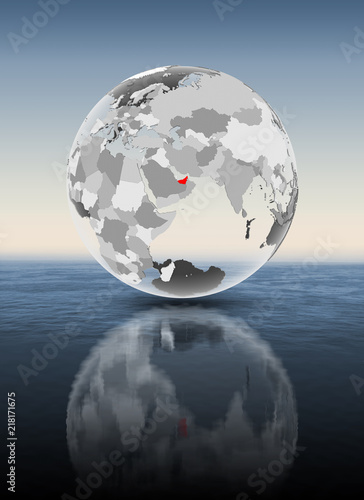 United Arab Emirates on translucent globe above water