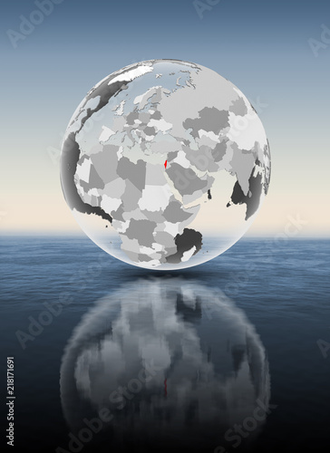 Israel on translucent globe above water