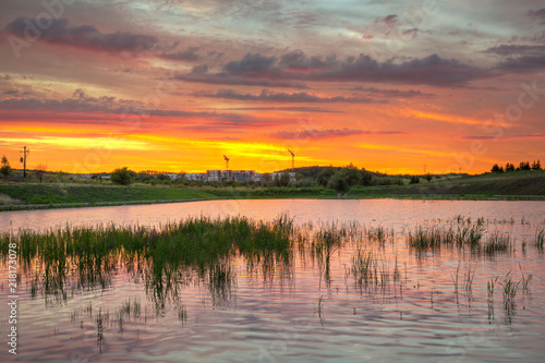 Amazing sunset over the pond in Poland