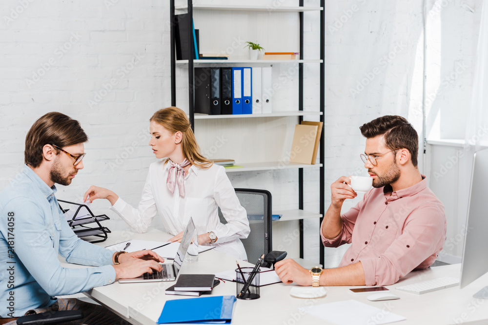 Fototapeta premium team of successful business partners having conversation at conference room of modern office