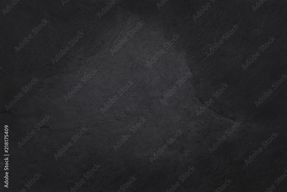 Fototapeta premium Dark grey black slate texture in natural pattern with high resolution for background and design art work. Black stone wall.
