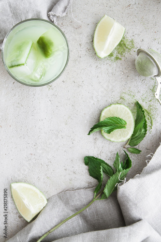 Refreshing lime drink with matcha ice cubes