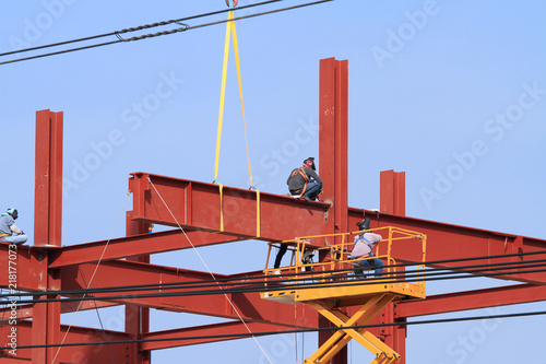 Steel frame structure and working man under construction