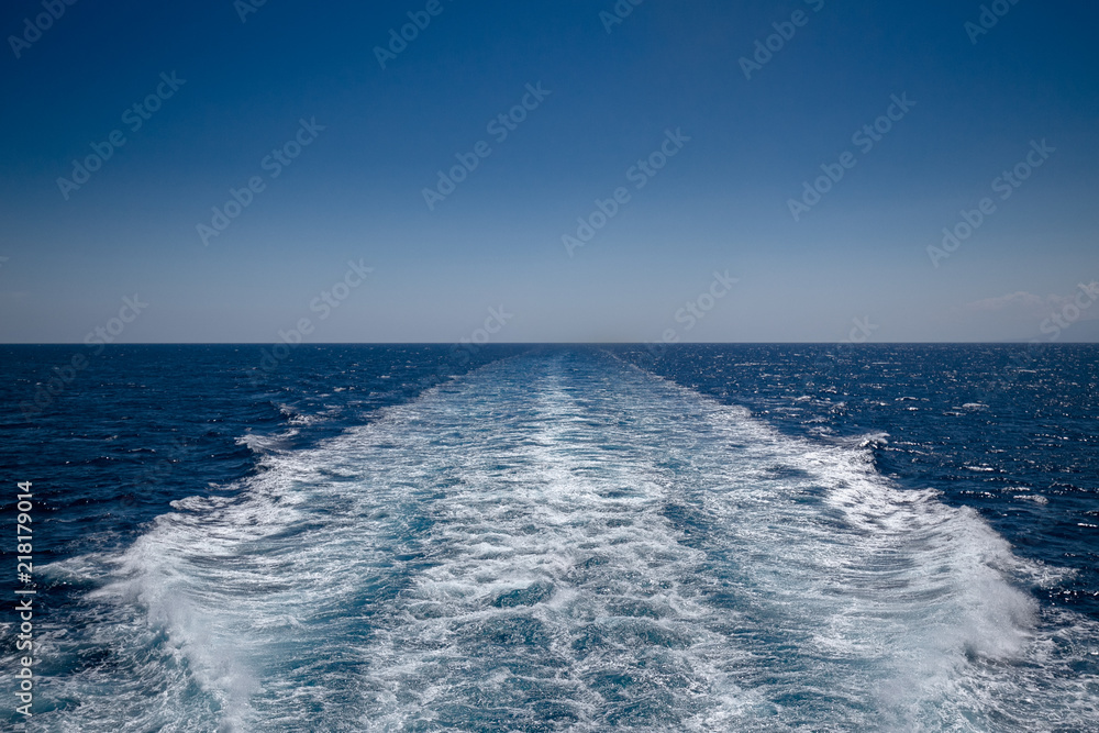Wake left by ship in transit, on the open sea