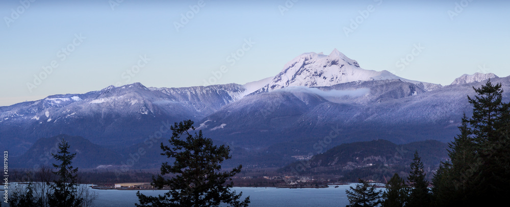 Snowy mountain peak near Squamish, BC, at dusk.