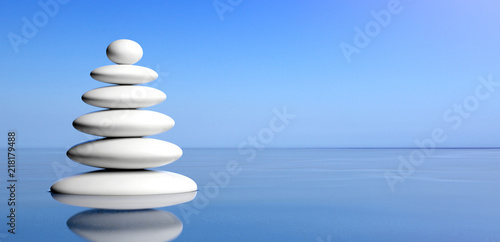 Zen stones stack on water, blue sky background. 3d illustration