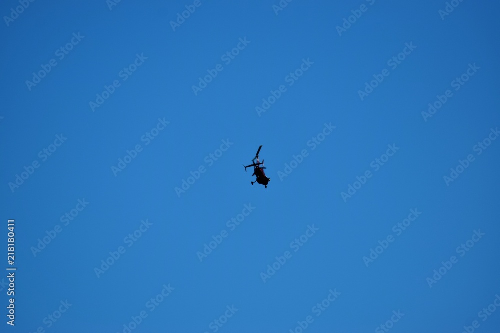 Modern helicopter flies in the sky Modern helicopter flies in the sky