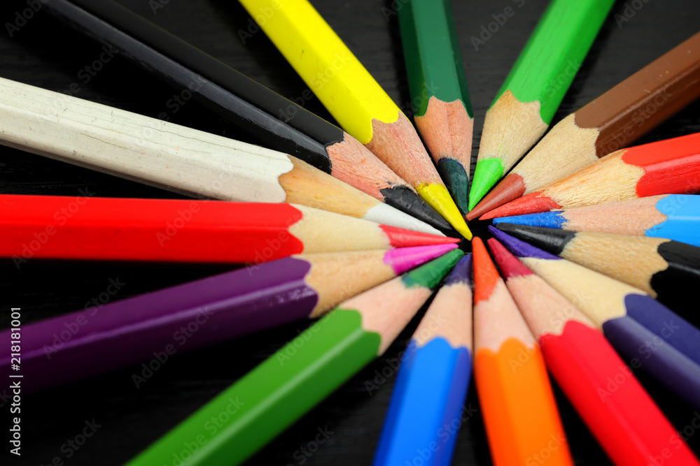 Colored pencils from stationery arranged in a circle Colored pencils from stationery arranged in a circle