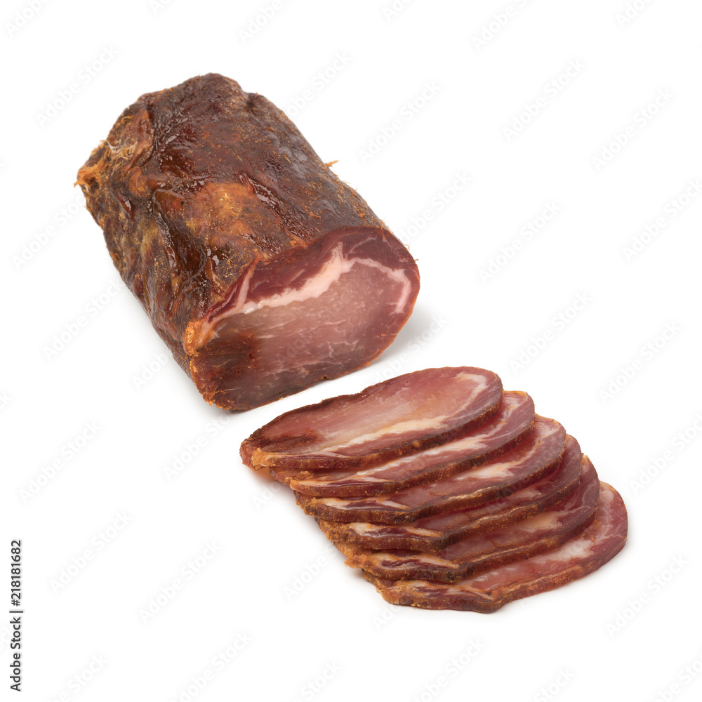 Piece of Lomo Embuchado meat and slices Piece of Lomo Embuchado meat and slices