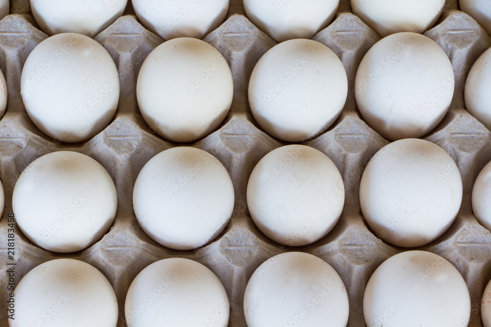 Eggs in tray. Eggs on the egg tray. a carton of fresh free range eggs Eggs in tray. Eggs on the egg tray. a carton of fresh free range eggs