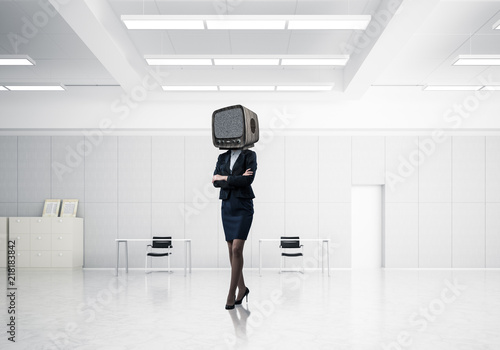 Business woman with an old TV instead of head.