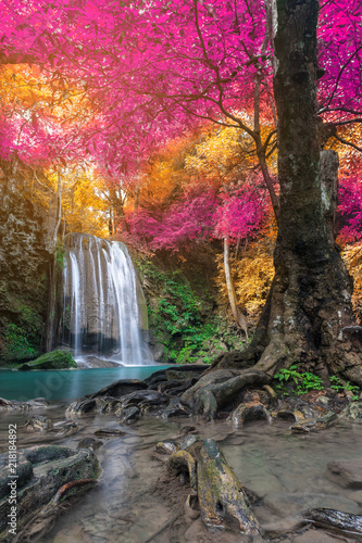 Amazing beauty of nature  waterfall at colorful autumn forest 
