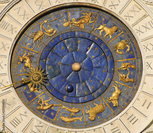 Ancient time, astrology and horoscope. Detail of Saint Mark Square old Clocktower with zodiac signs, plantes ans stars (15th century)