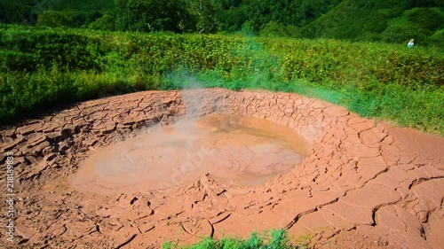 Mud pots in Valley of Geysers. Tourist season in Kamchatka Peninsula. Kronotsky Nature Reserve. The summer stock footage video